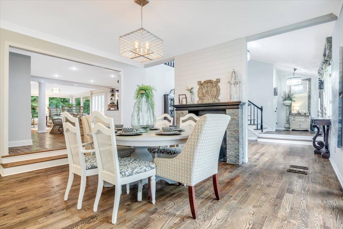 Open dining room connected to multiple gathering spaces